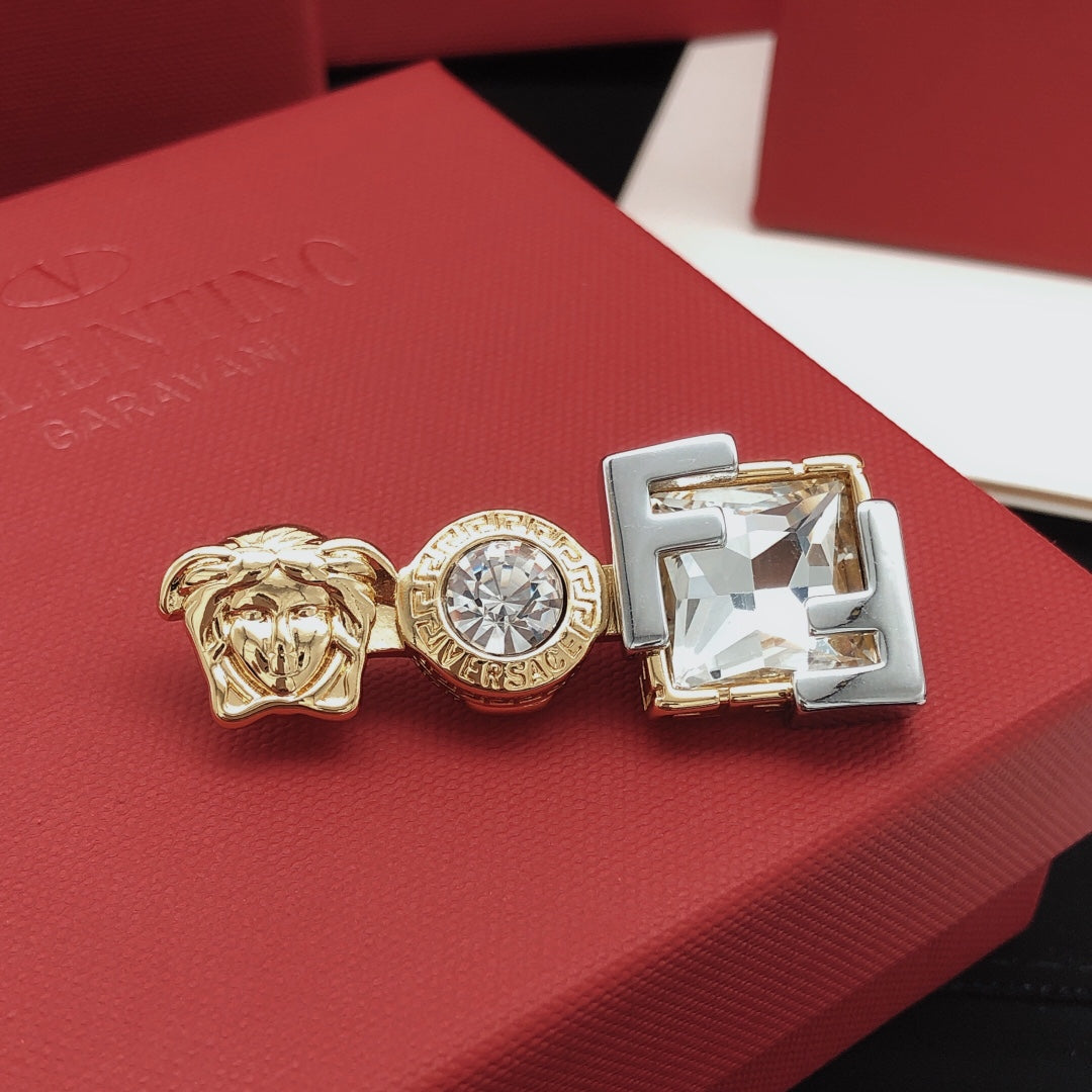 Statement Emblem Brooch Pin in Polished Metal-Tone detail view