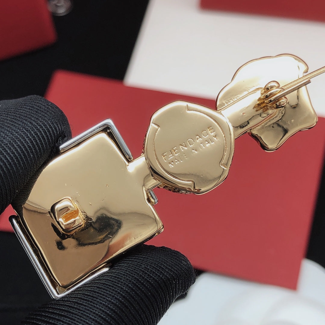 Statement Emblem Brooch Pin in Polished Metal-Tone detail view