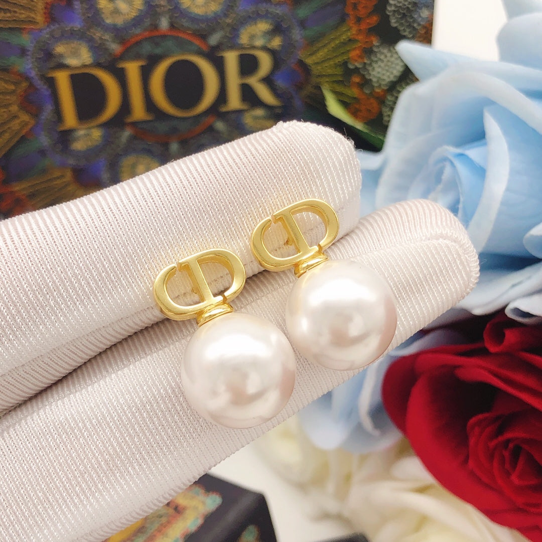 Pearl-Style Motif Stud Earrings in Polished Metal-Tone with Pearl-Style Detail – Design 020 styled view