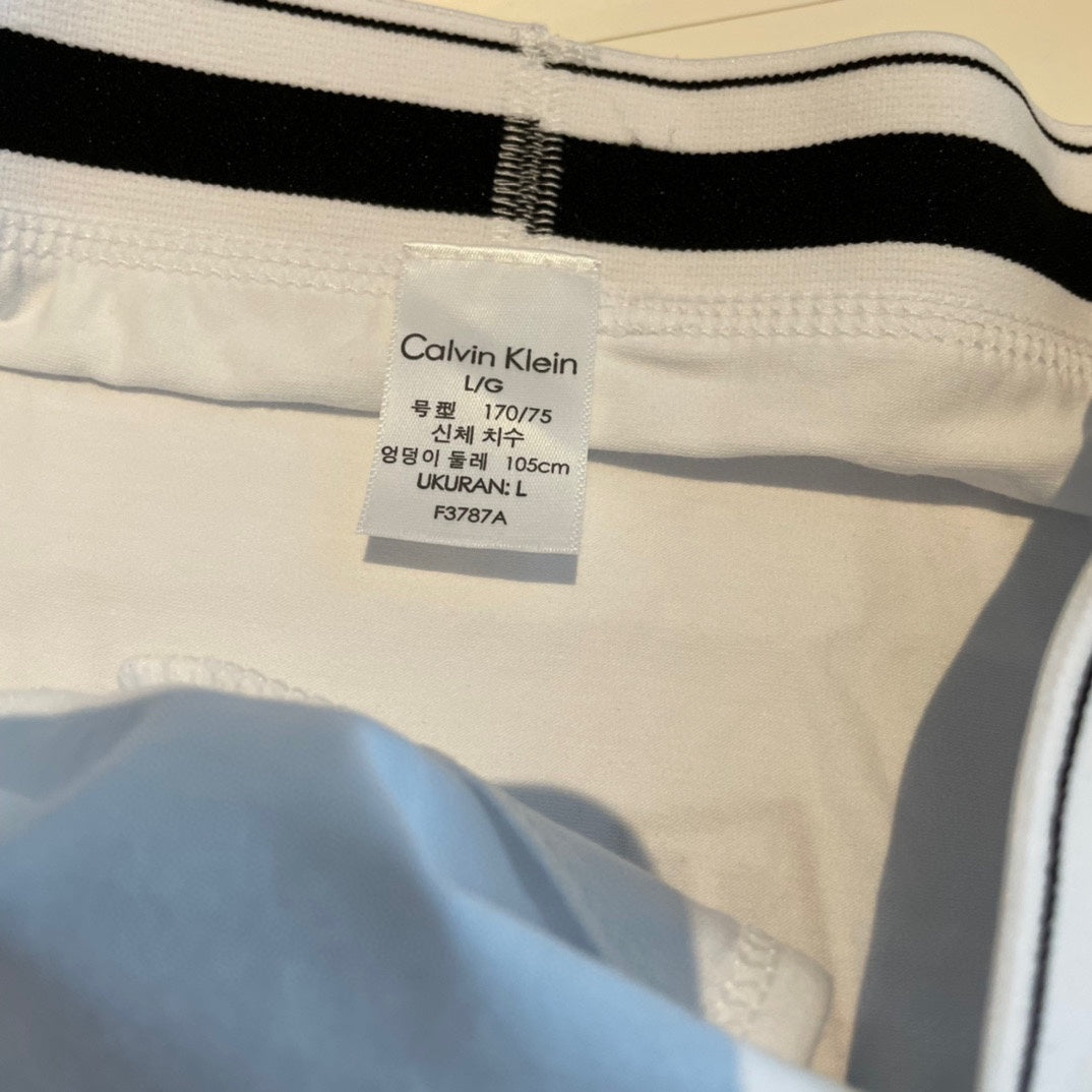 Calvin Klein White Triangle Bra and Brief Set Women's Bra & Brief Set - 2-Piece Set