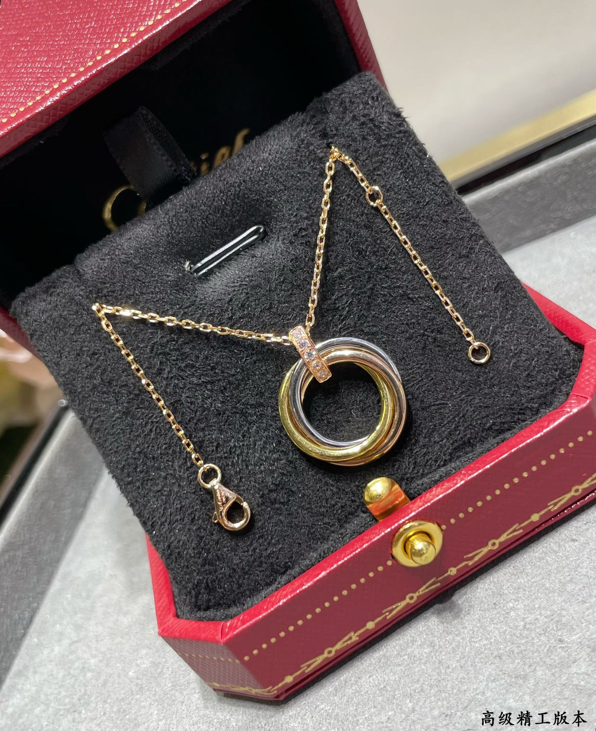 Triple-Ring Motif Pendant Necklace in Gold-Tone side detail