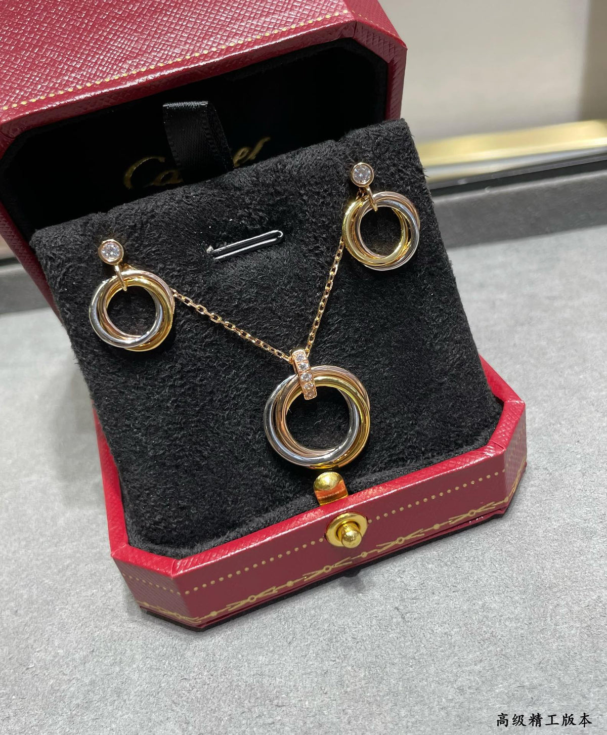 Triple-Ring Motif Pendant Necklace in Gold-Tone front view