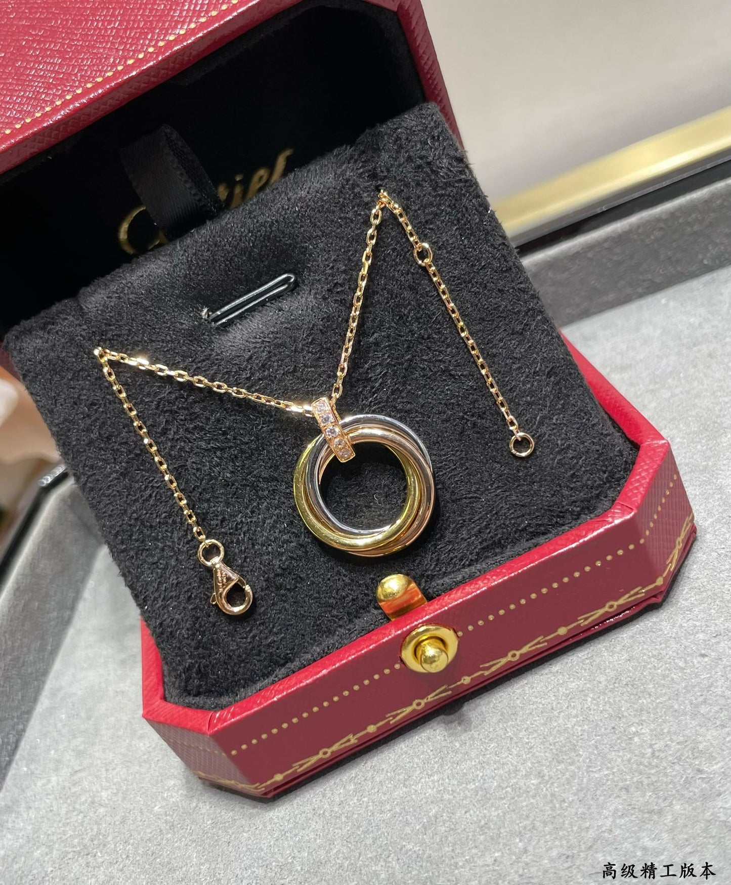 Triple-Ring Motif Pendant Necklace in Gold-Tone main product view
