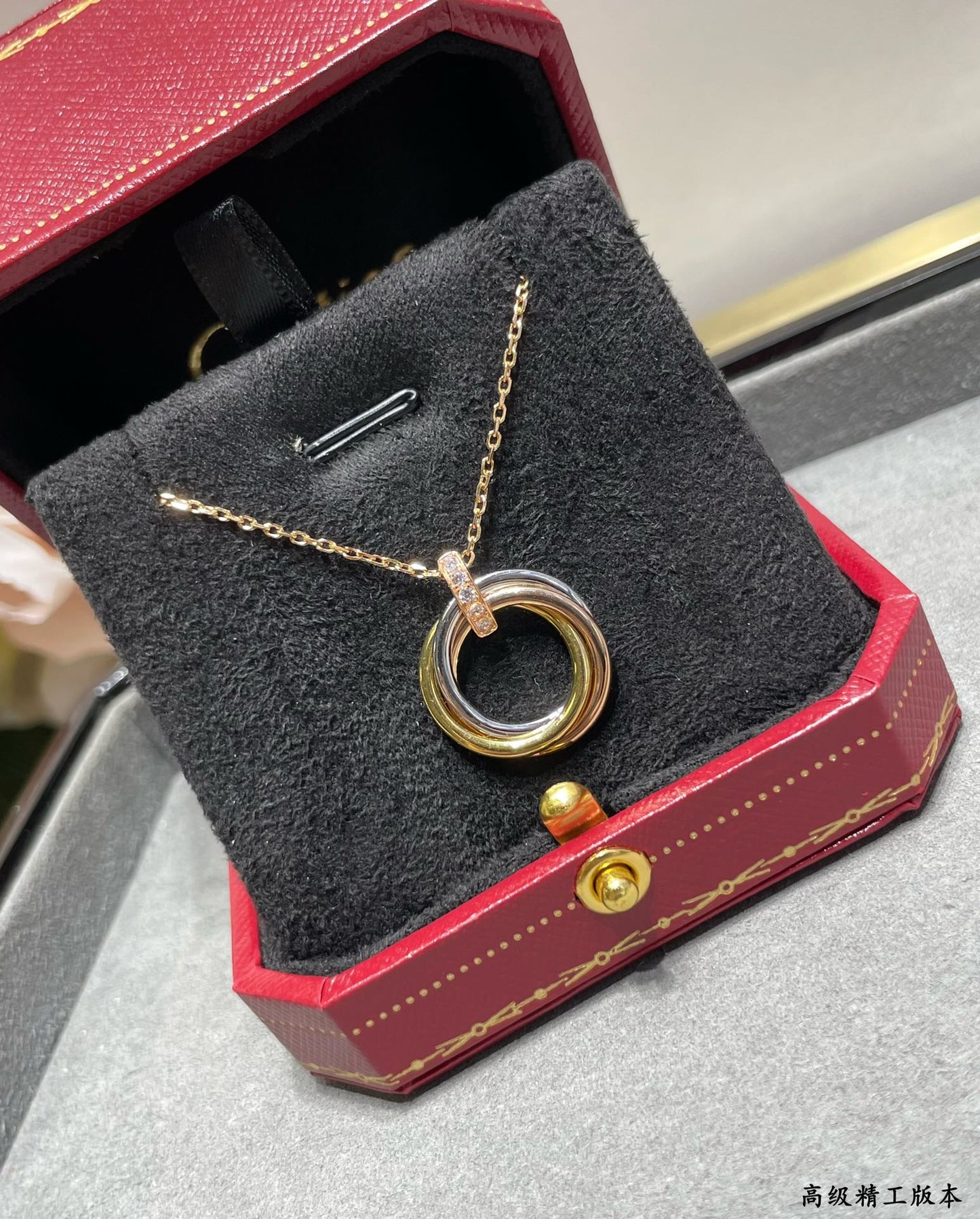 Triple-Ring Motif Pendant Necklace in Gold-Tone front view
