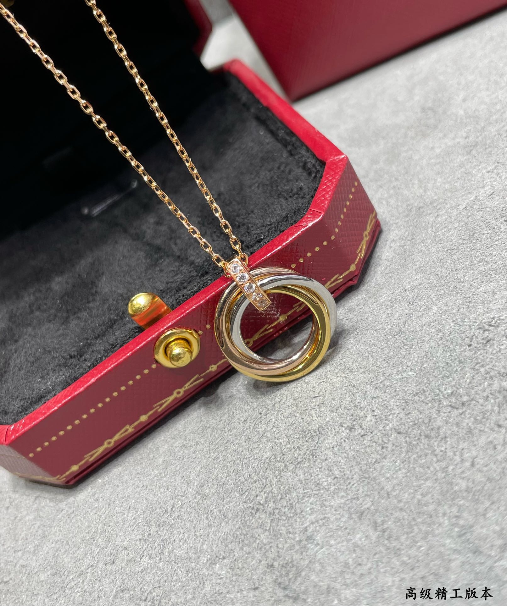 Triple-Ring Motif Pendant Necklace in Gold-Tone styled view