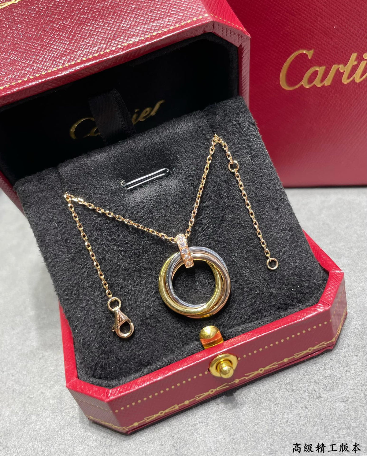 Triple-Ring Motif Pendant Necklace in Gold-Tone detail view