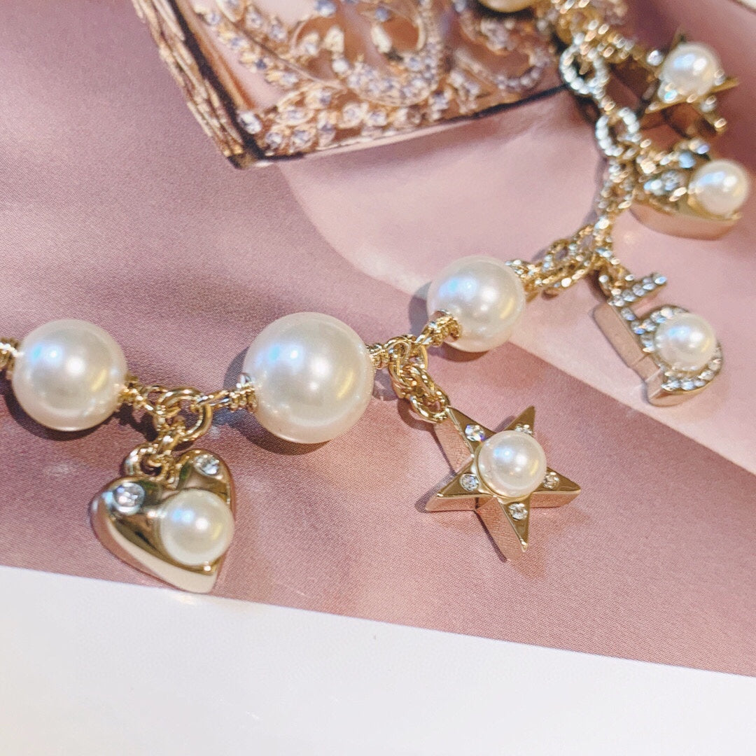 Double-C Emblem Pearl-Detail Pendant Necklace – Pearl Detail – Design 020 styled product view