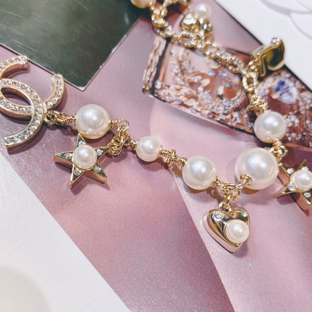 Double-C Emblem Pearl-Detail Pendant Necklace – Pearl Detail – Design 020 close-up detail
