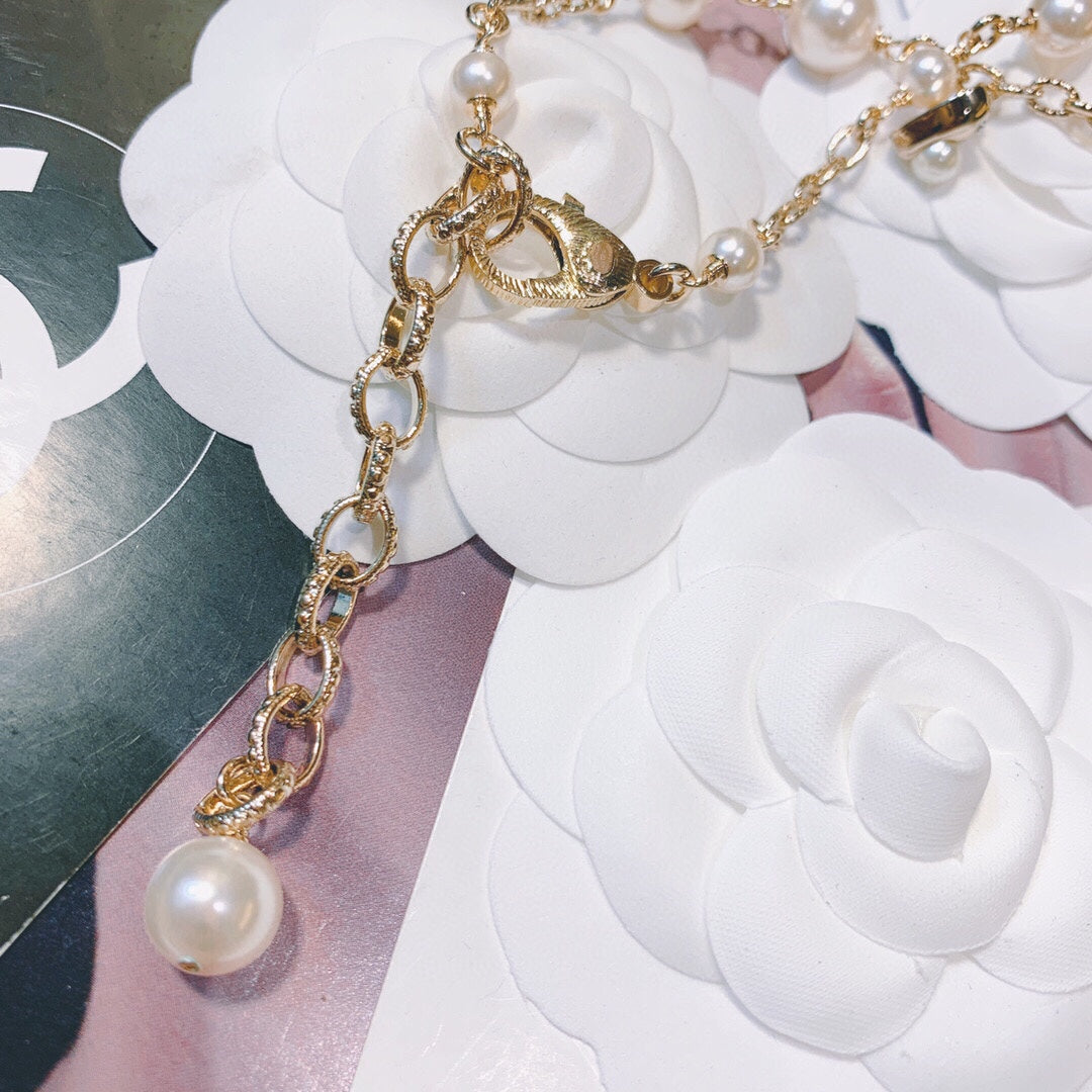 Double-C Emblem Pearl-Detail Pendant Necklace – Pearl Detail – Design 020 detail view
