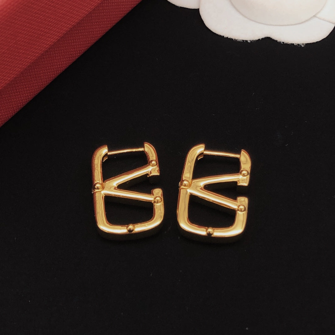 Signature Emblem Drop Earrings in Gold-Tone – Design 02 close-up view
