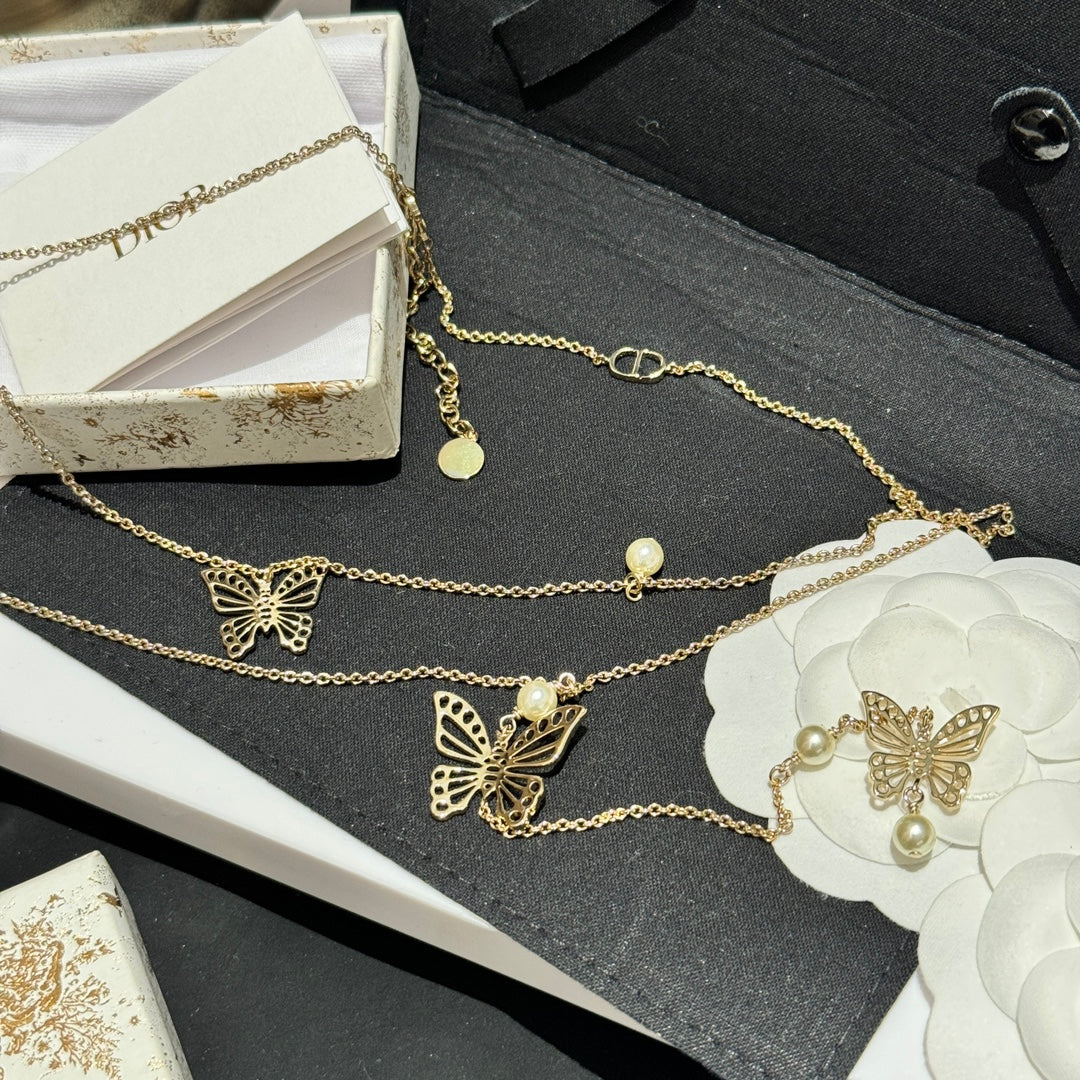 Bow & Butterfly Motif Pendant Necklace in Gold-Tone with Layered Detail – Design 001 close-up detail
