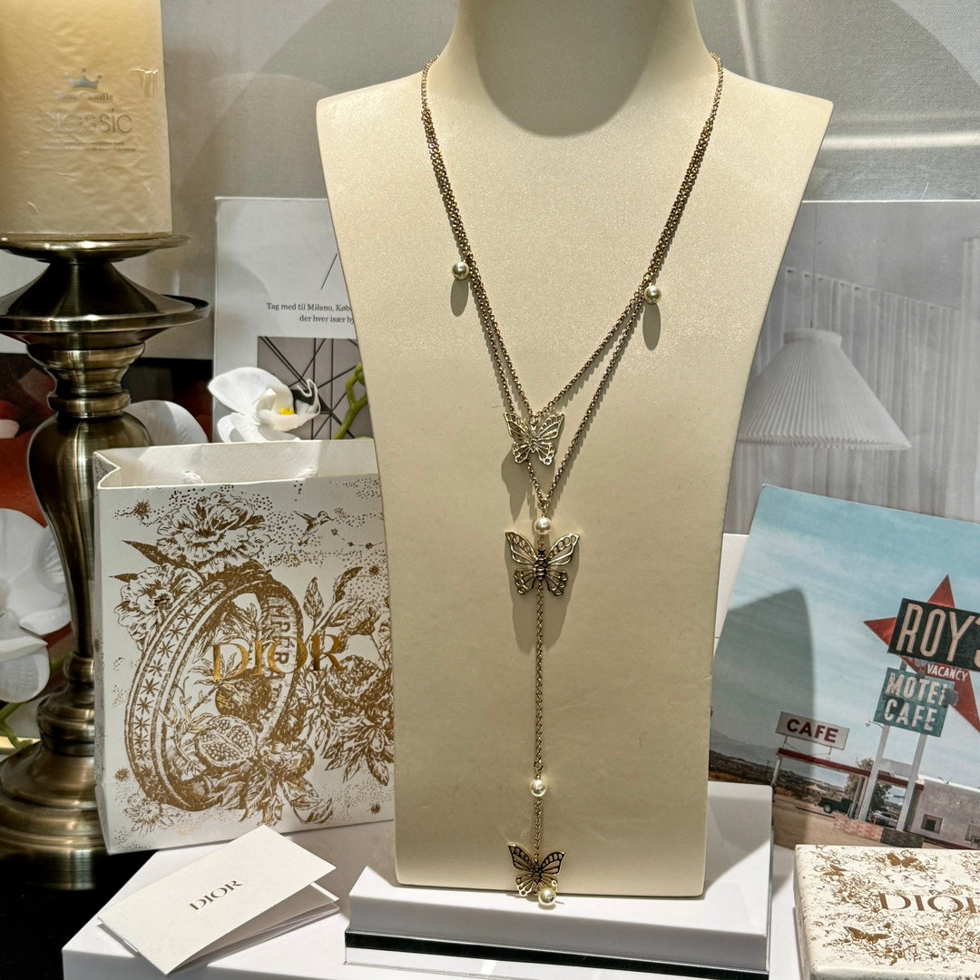 Bow & Butterfly Motif Pendant Necklace in Gold-Tone with Layered Detail – Design 001 main product view