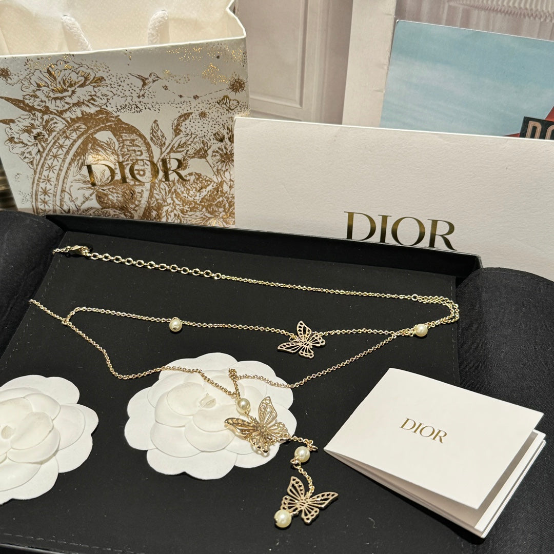 Bow & Butterfly Motif Pendant Necklace in Gold-Tone with Layered Detail – Design 001 detail view