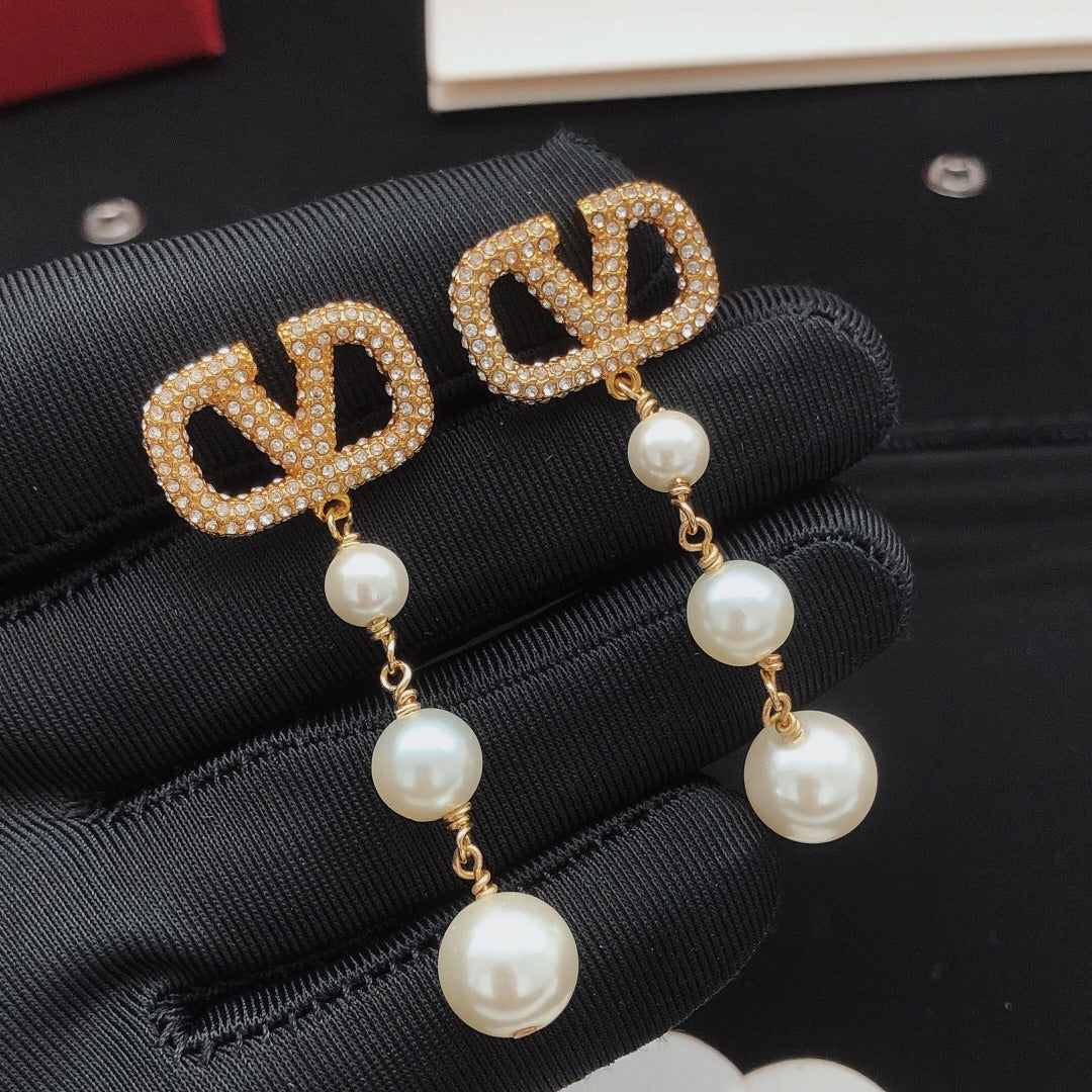 Signature Emblem Stud Earrings in Gold-Tone – Design 13 front view