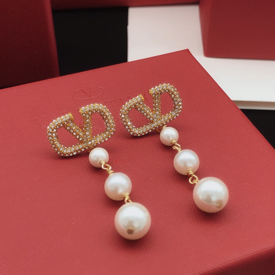 Signature Emblem Stud Earrings in Gold-Tone – Design 13 styled detail
