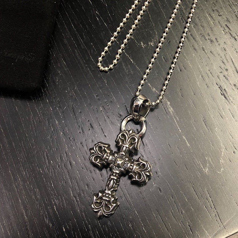Cross Pendant Necklace in Metal-Tone – Flame Detail styled product view