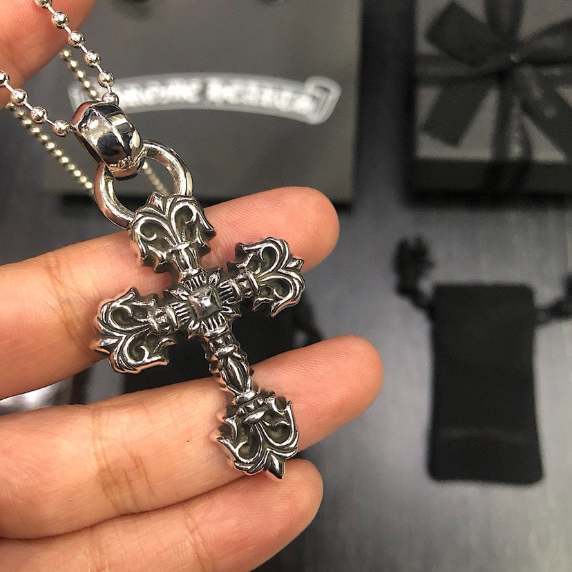Cross Pendant Necklace in Metal-Tone – Flame Detail detail view