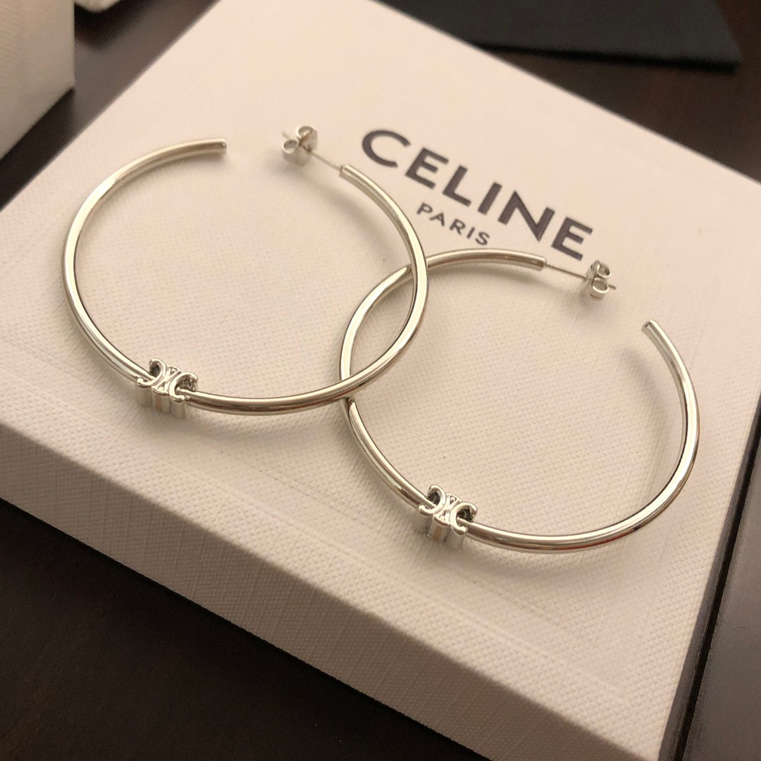 Oversized Triomphe-Inspired Emblem Statement Earrings detail view