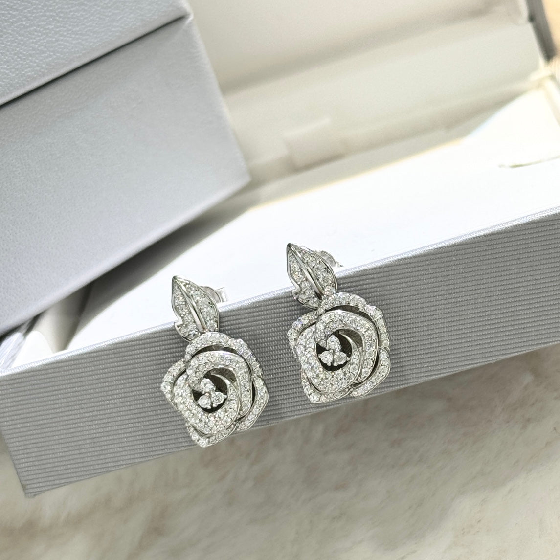 Floral Motif Stud Earrings in Silver-Tone front view
