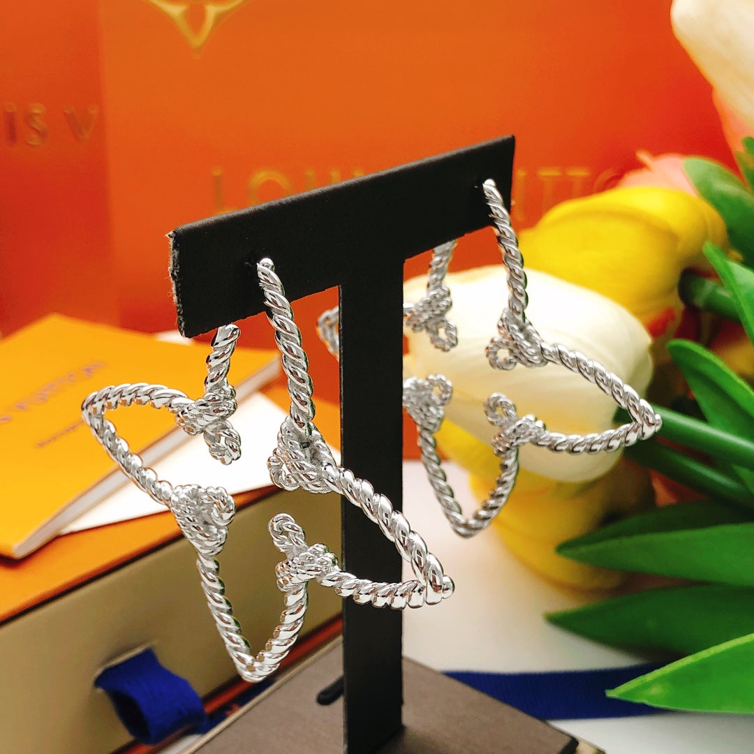 Twist Stud Earrings in Silver-Tone styled product view