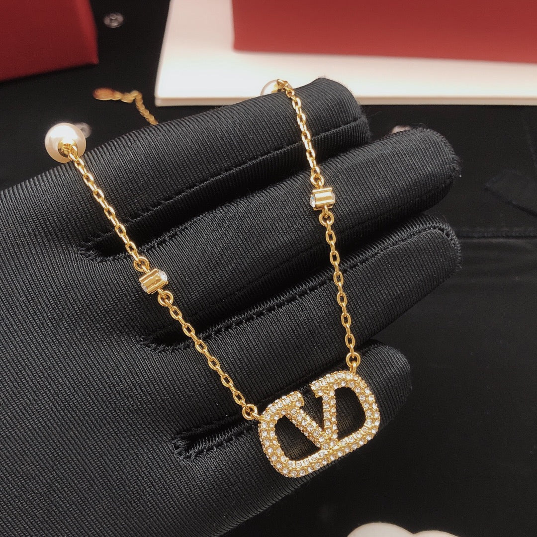 Signature Emblem Pendant Necklace in Gold-Tone – Design 02 front view