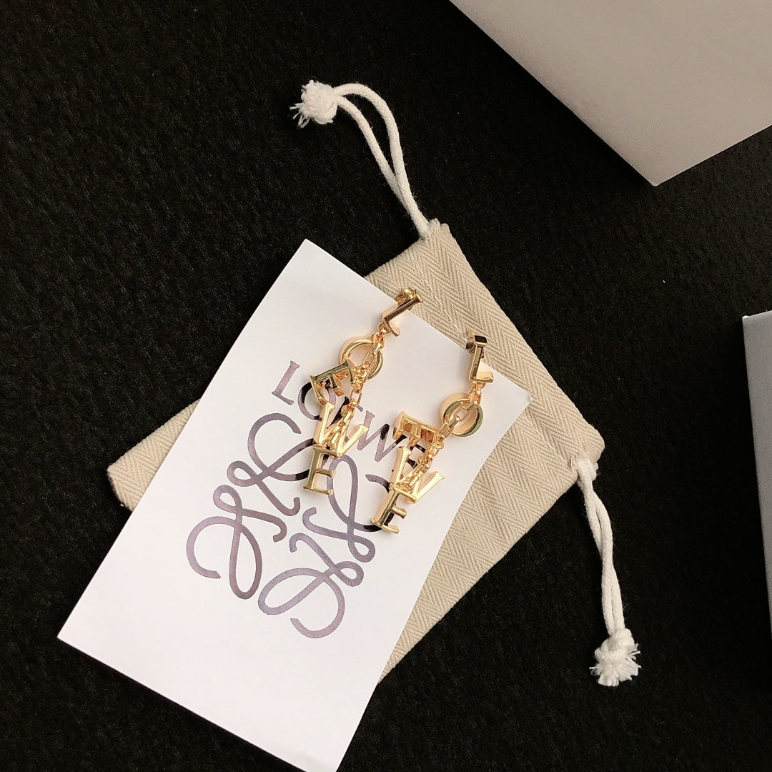 Floral Motif Stud Earrings in Gold-Tone – Design 03 styled view