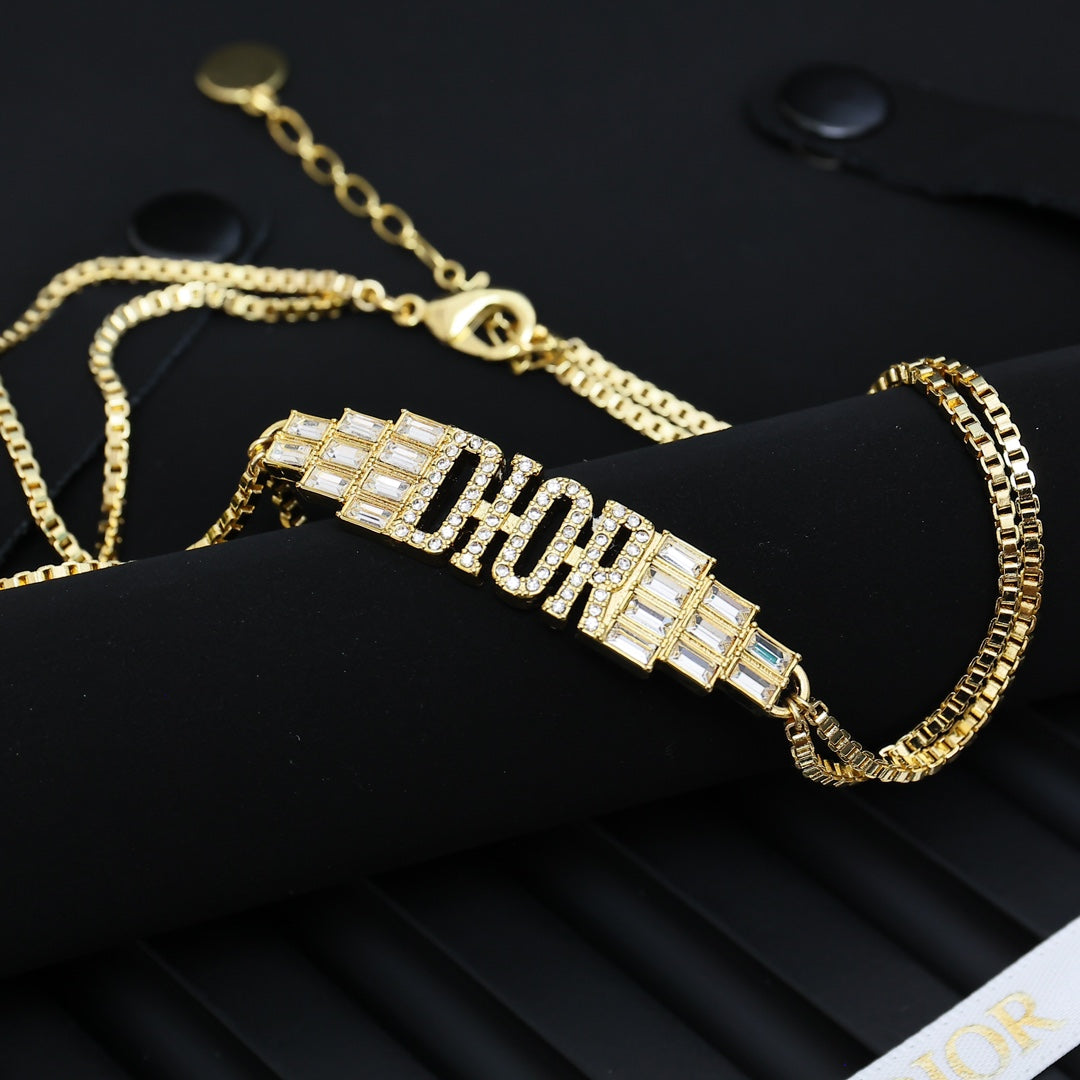 Graphic Letter Motif Pendant Necklace in Polished Metal-Tone with Crystal-Style Accents – Design 004 front view