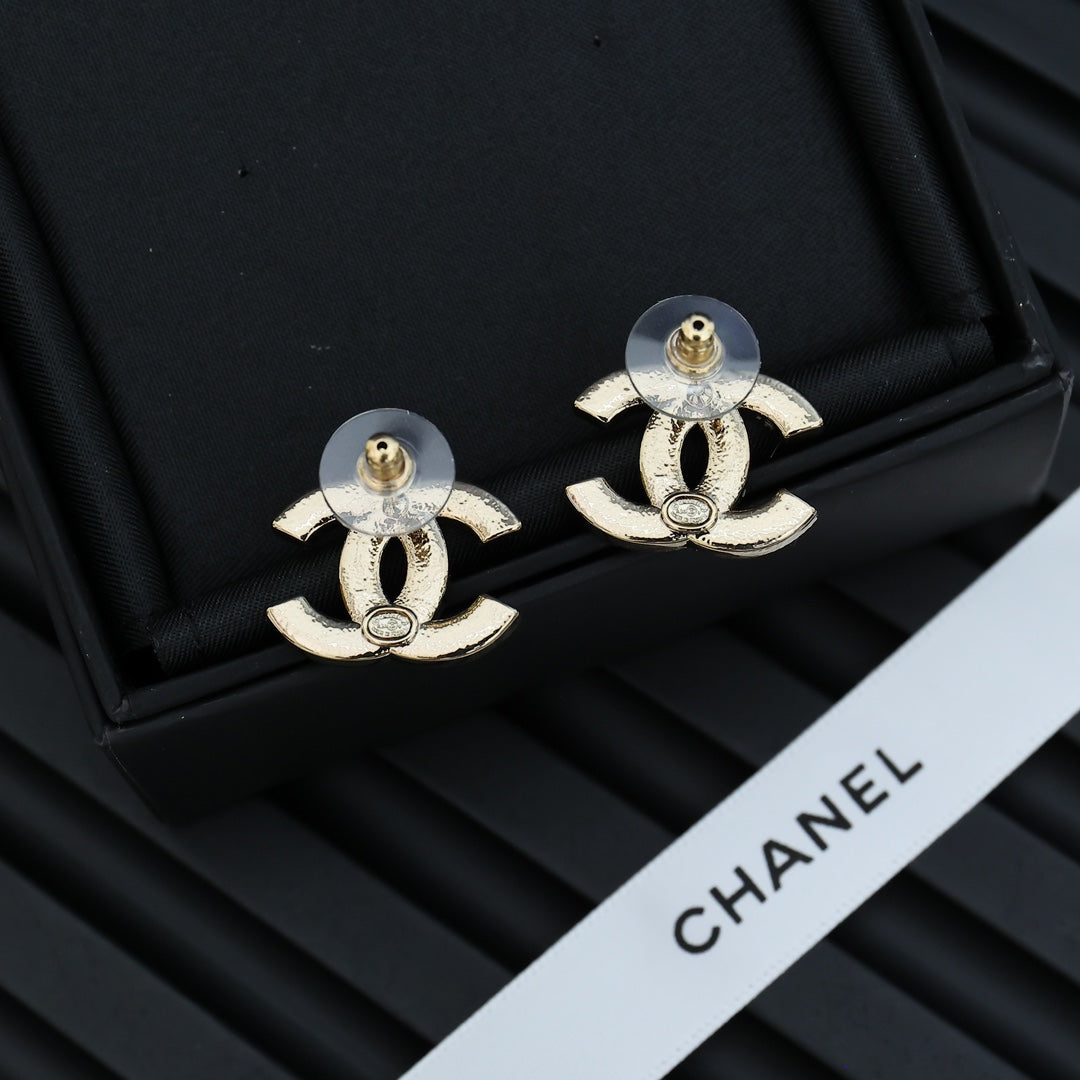 Double-C Emblem Stud Earrings in Polished Metal-Tone – Design 202 detail view