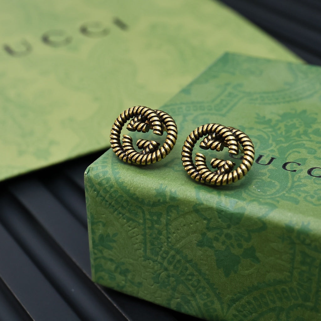Serpentine Stud Earrings in Polished Metal-Tone main product view