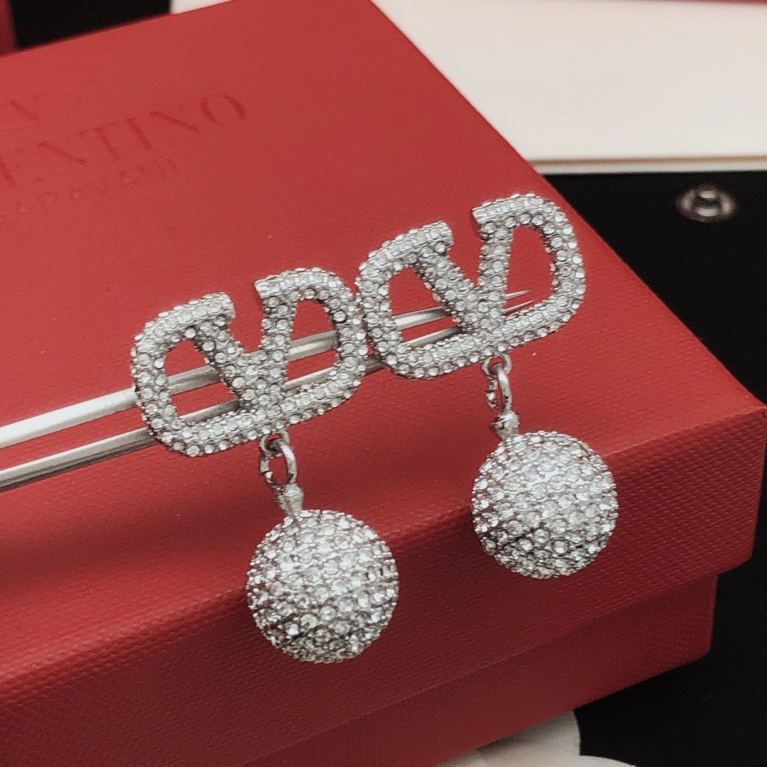 Signature Emblem Crystal-Accent Stud Earrings – Design 01 styled detail