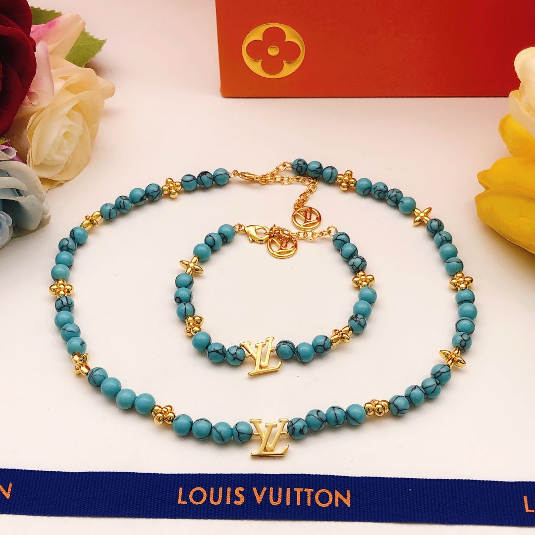 Geometric Emblem Pendant Necklace in Gold-Tone – Blue Detail – Design 007 close-up detail