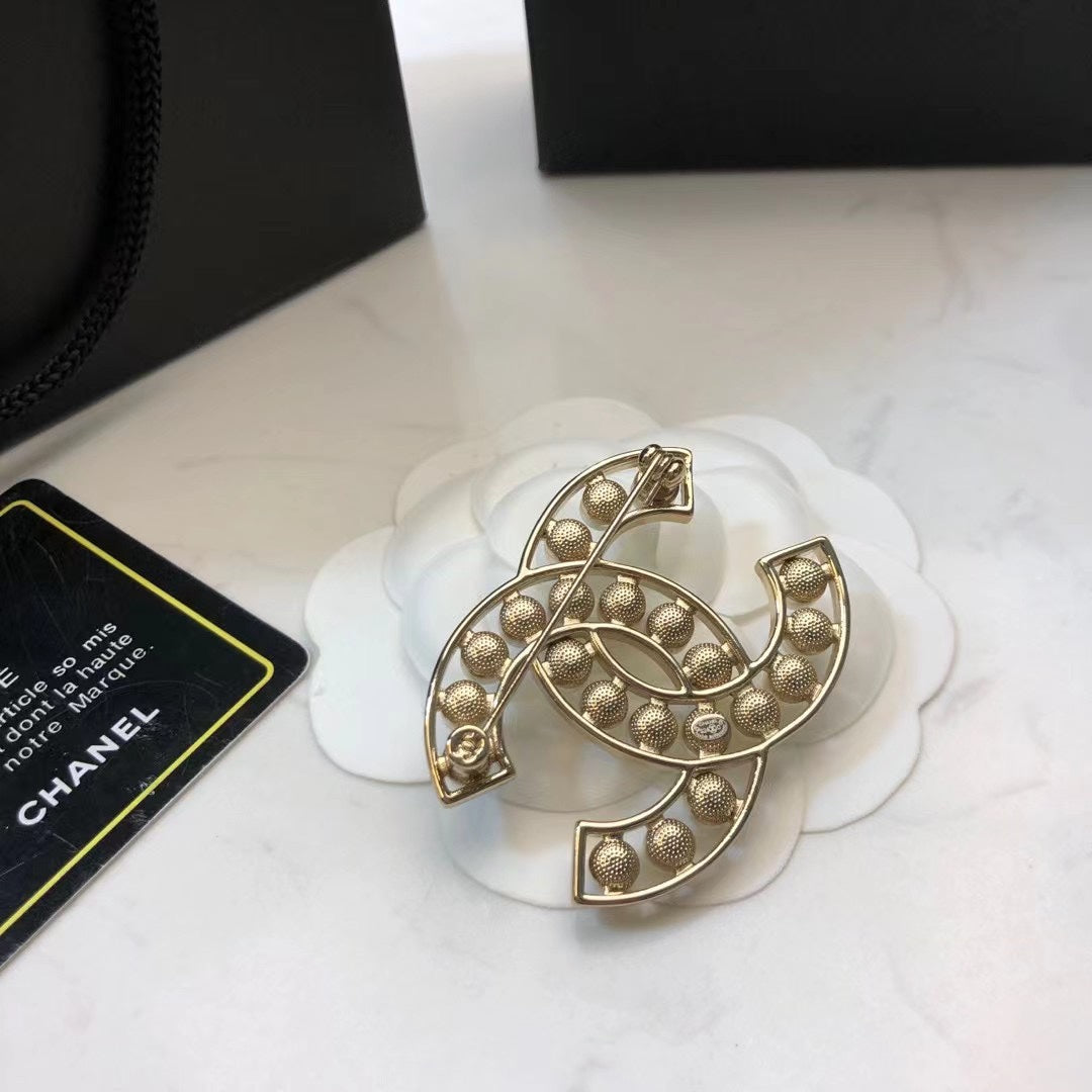 Double-C Emblem Brooch in Polished Metal-Tone – Design 039 front product view