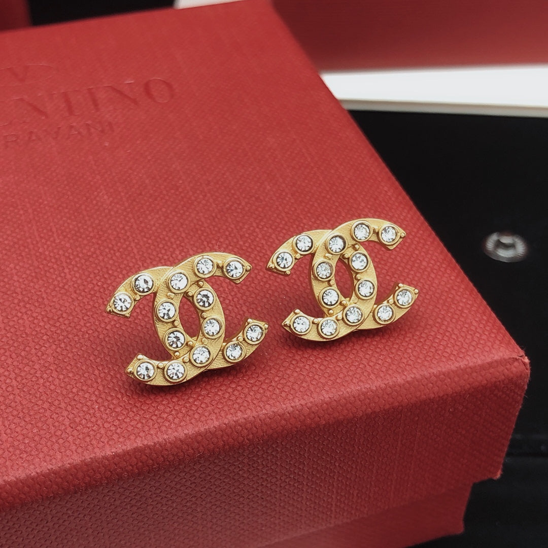 Signature Emblem Crystal-Accent Stud Earrings – White Detail front product view