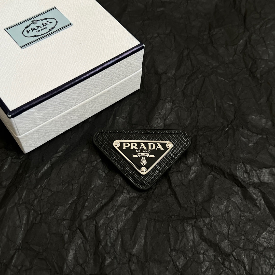 Signature Emblem Brooch in Polished Metal-Tone main product view