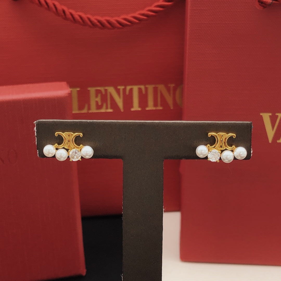 Mini Mini Stud Earrings front view