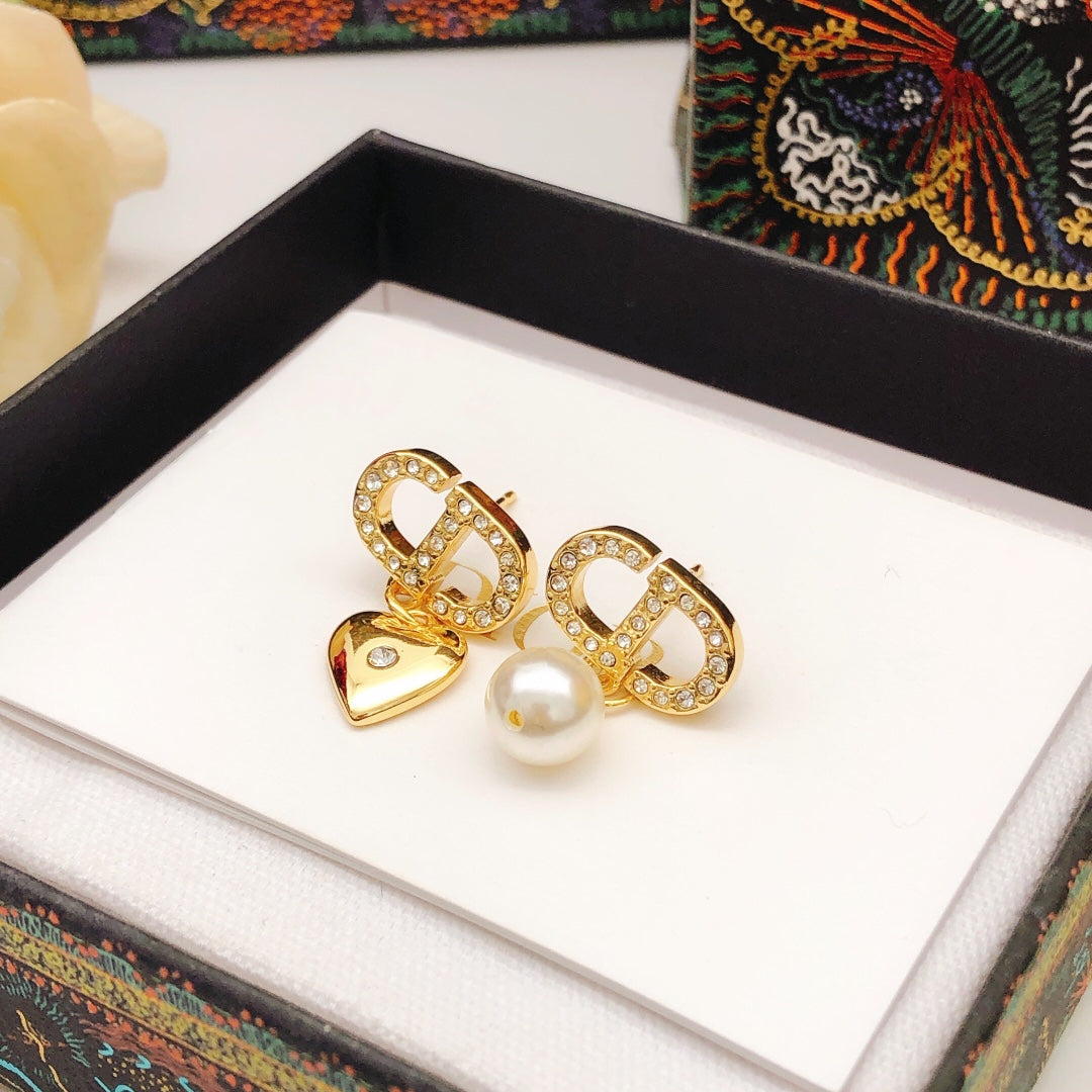 Pearl-Style Motif Stud Earrings in Polished Metal-Tone with Pearl-Style Detail – Design 019 styled view