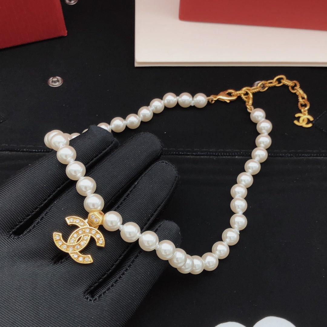 Double-C Emblem Pearl-Detail Pendant Necklace – Pearl Detail – Design 110 main product view