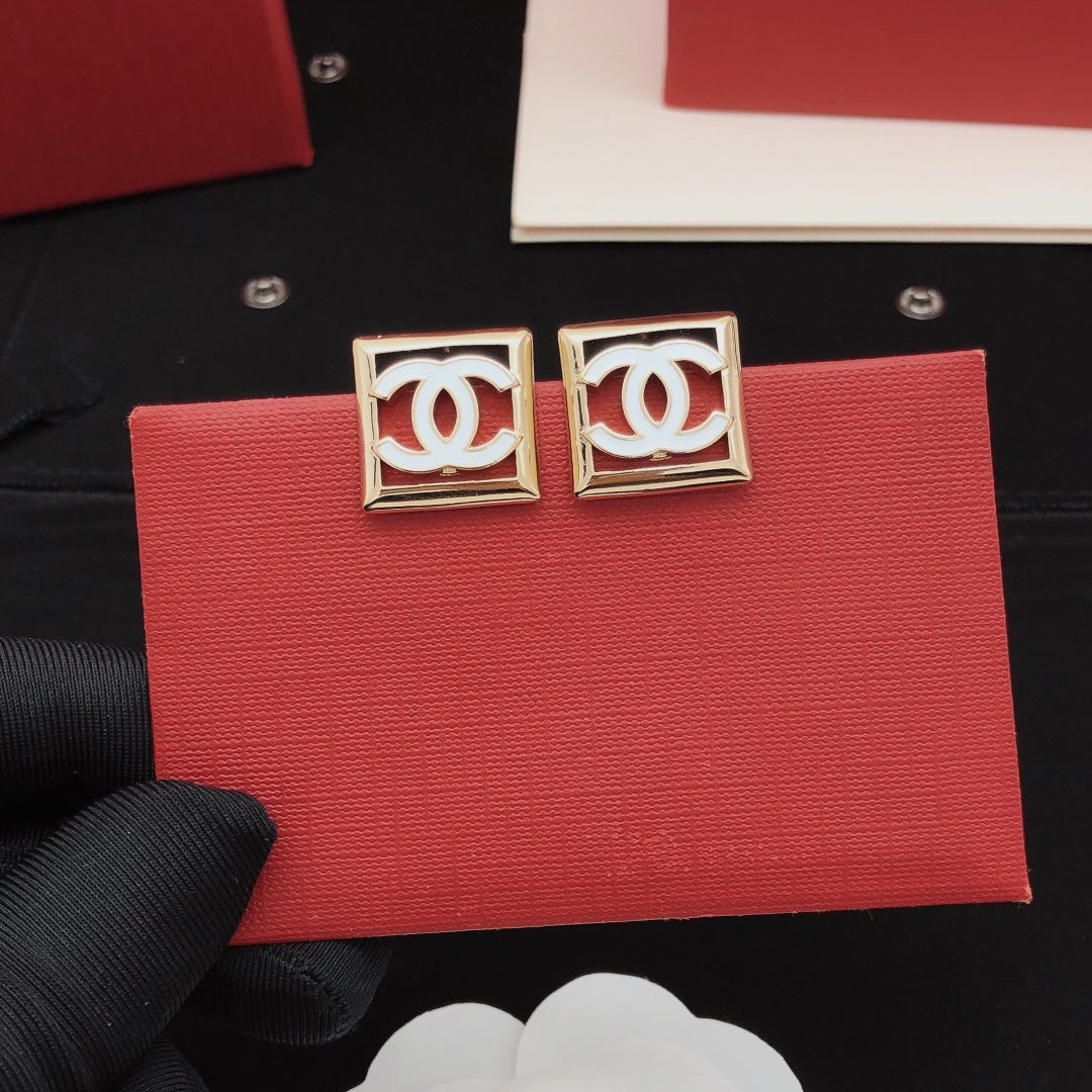 Square Stud Earrings in Gold-Tone – White Detail styled product view
