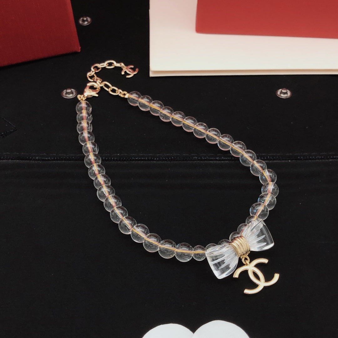 Bow Pearl-Detail Pendant Necklace – Pearl Detail detail view