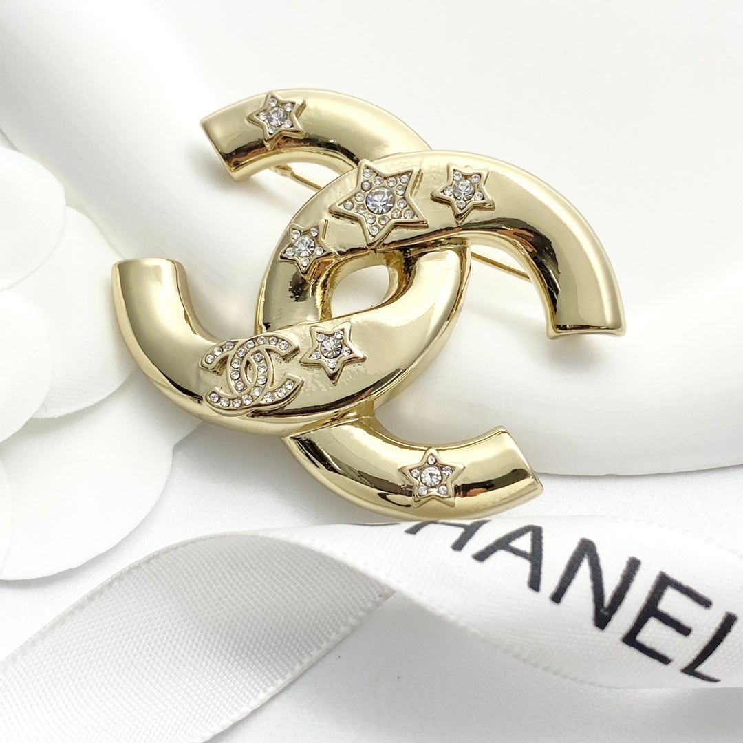Double-C Emblem Brooch in Gold-Tone – Star Detail main product view