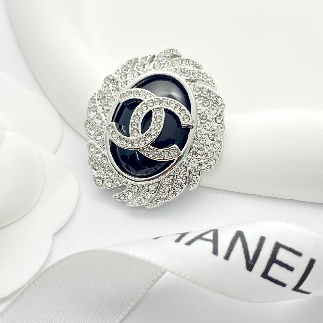 Signature Emblem Brooch in Black-Tone styled product view