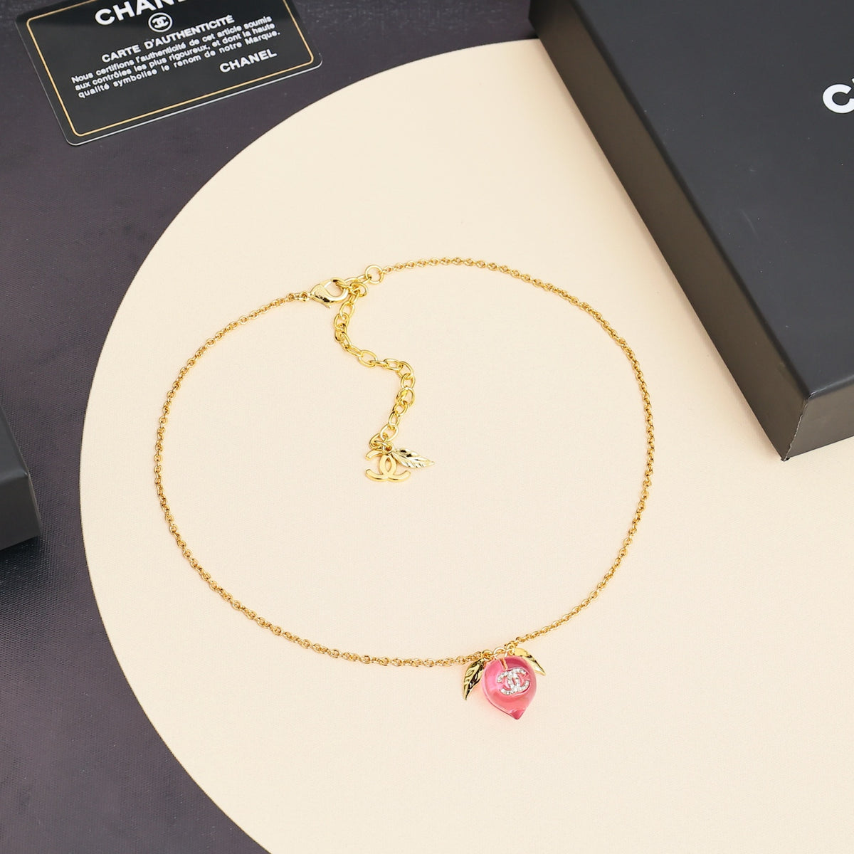 Signature Emblem Pendant Necklace in Polished Metal-Tone – Pink Detail side detail