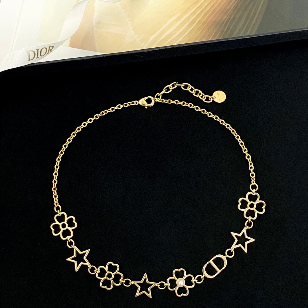 Star Motif Pendant Necklace in Polished Metal-Tone with Openwork Detail close-up detail