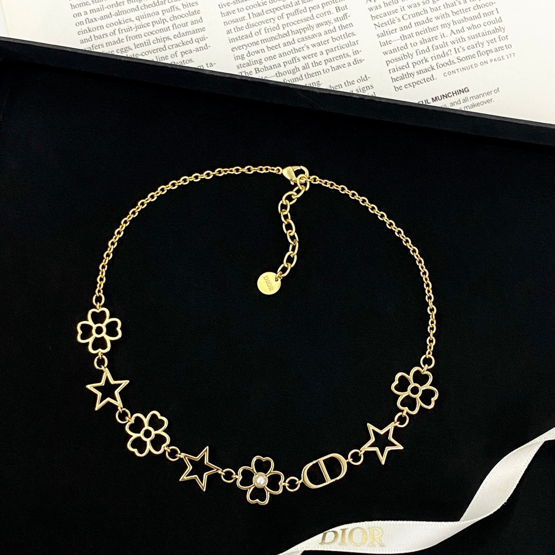 Star Motif Pendant Necklace in Polished Metal-Tone with Openwork Detail front view