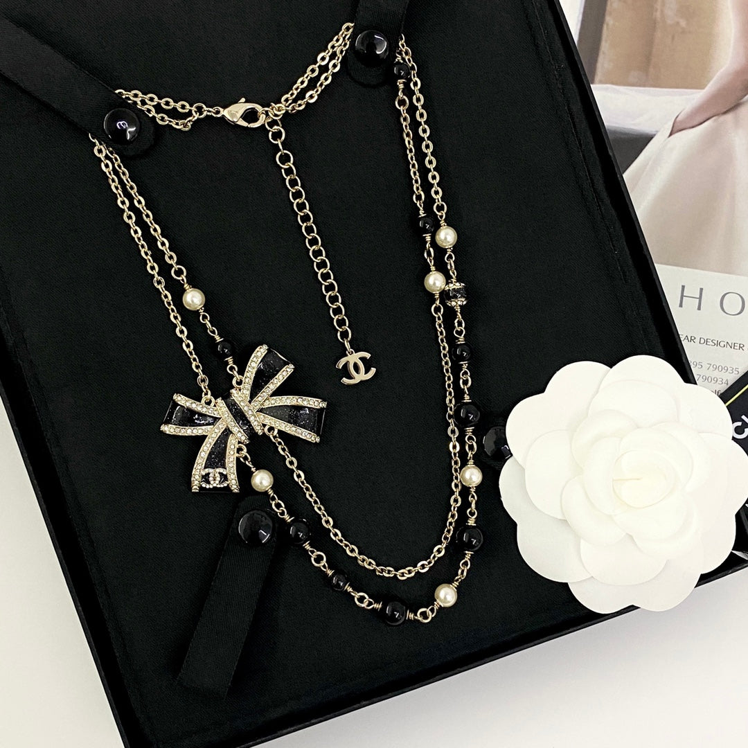 Bow Pearl-Detail Pendant Necklace – Pearl Detail – Design 010 side detail