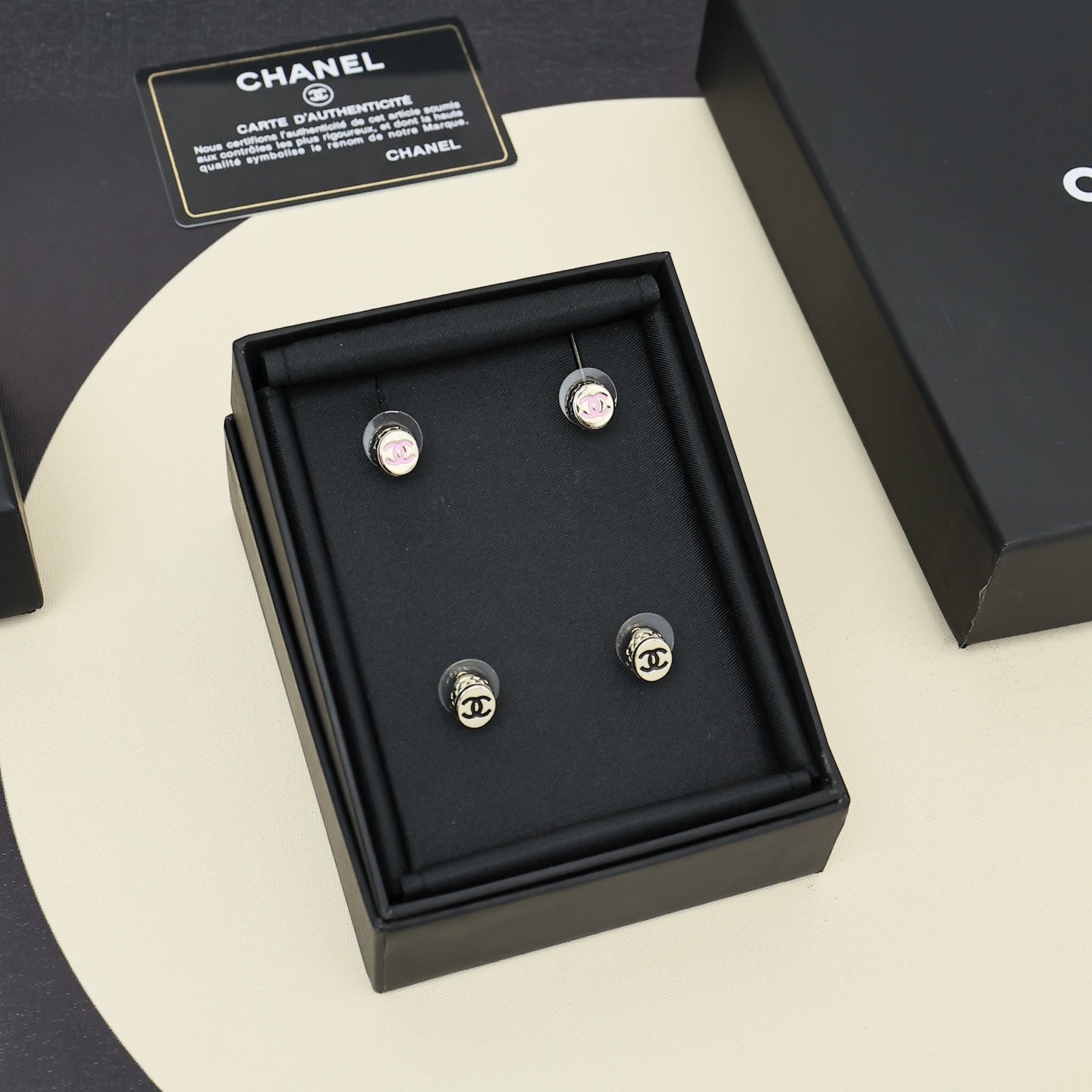 Signature Emblem Stud Earrings in Polished Metal-Tone – Pink Detail styled product view