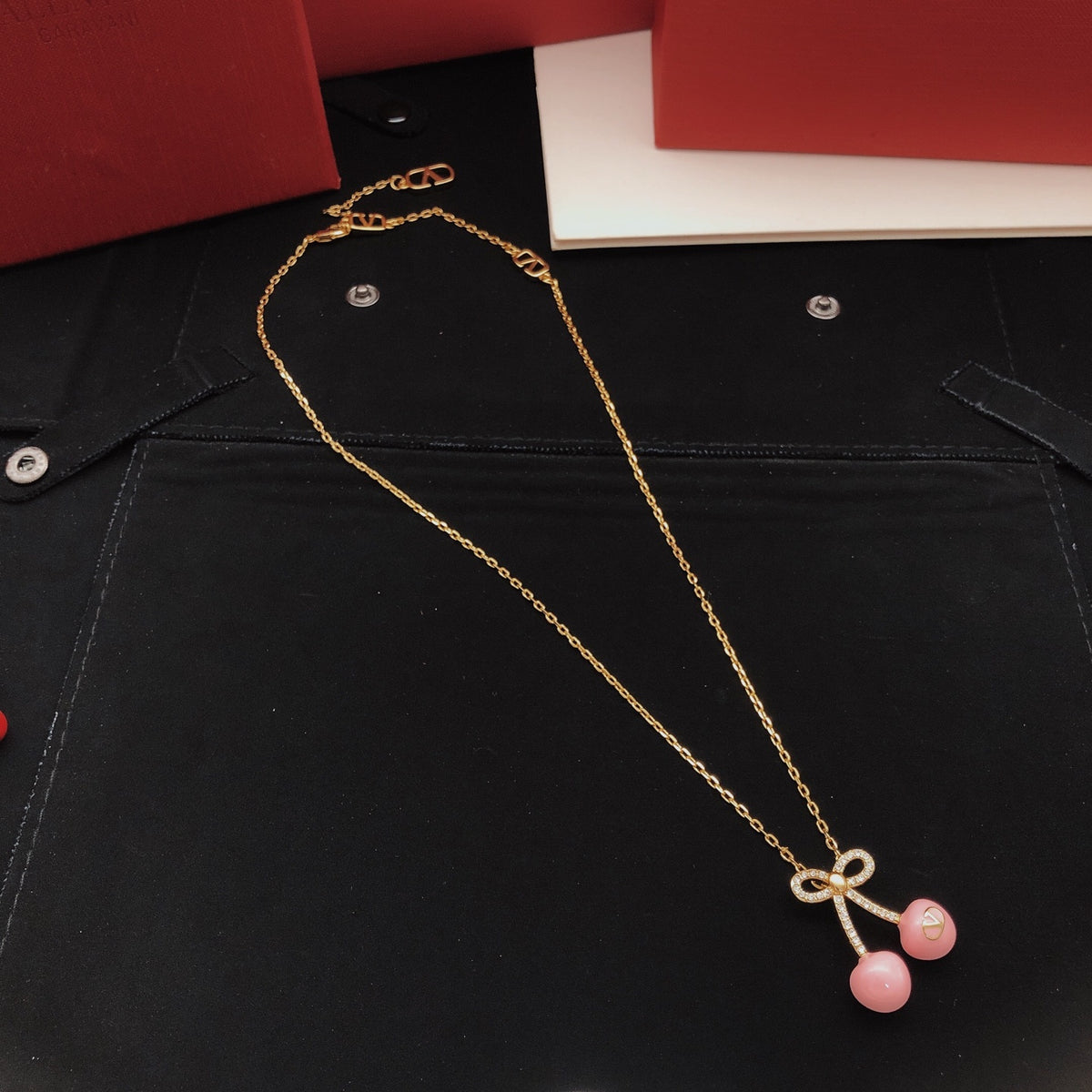 Bow Crystal-Accent Pendant Necklace styled detail