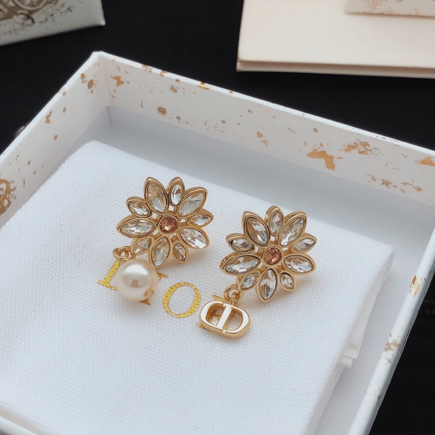 Floral Motif Stud Earrings in Polished Metal-Tone with Crystal-Style Accents – Design 001 styled view