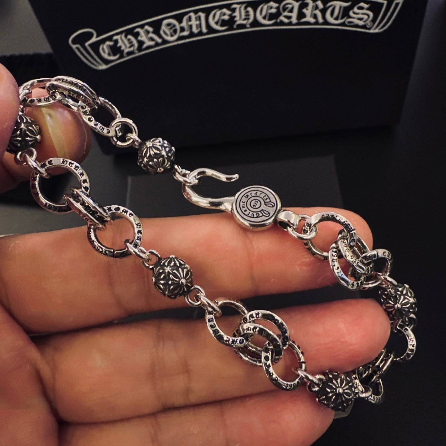 Signature Emblem Bracelet in Polished Metal-Tone – Design 010 close-up detail