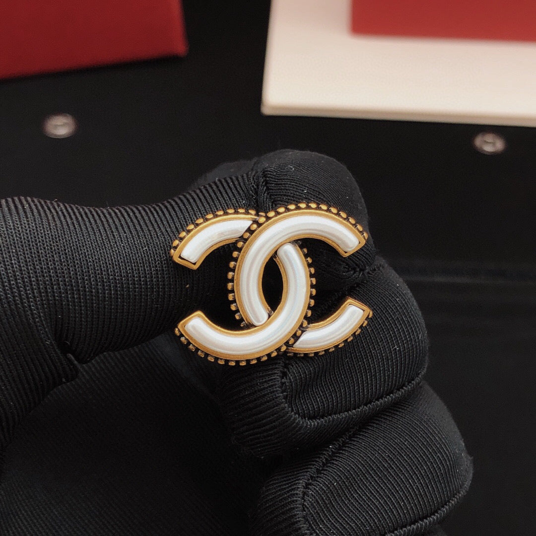 Double-C Emblem Stud Earrings in Gold-Tone – White Detail main product view